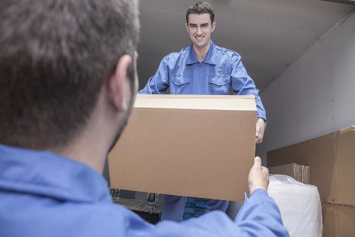 Professional commercial moving team handling office furniture in Lewisham