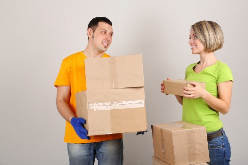 Professional movers handling furniture