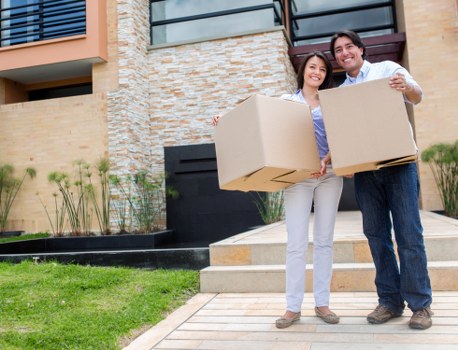 Loading furniture into a van for a Lewisham removal